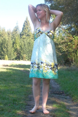 ana relaxes in the meadow